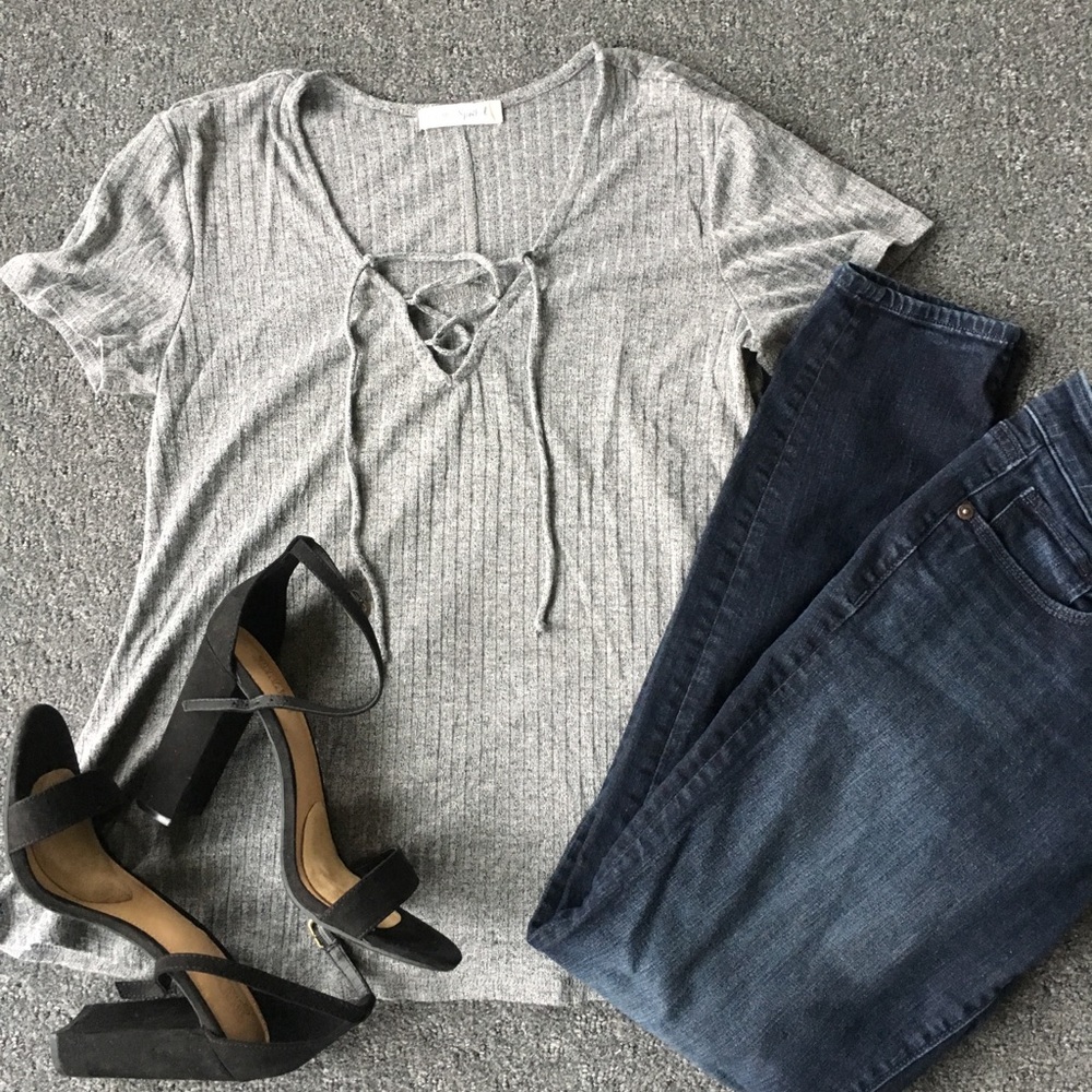 Lightly flared lace up gray top